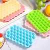 Honeycomb silicone ice cube trays with lids, featuring 37 hexagonal cells in blue, green, yellow, and pink colors.