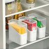 Stackable fridge organizer bin with lid, clear plastic food storage container for kitchen snacks and cheese slices.