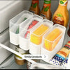 Stackable fridge organizer bin with lid, clear food storage container for kitchen snacks, cheese, and pantry items.