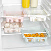 Stretchable fridge organizer basket for adjustable space-saving storage of food and produce in refrigerator shelves.